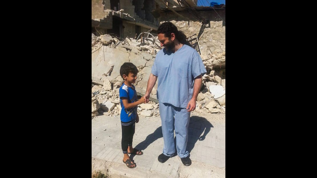  Dr. Samer Attar meeting one of the children who live in eastern Aleppo.