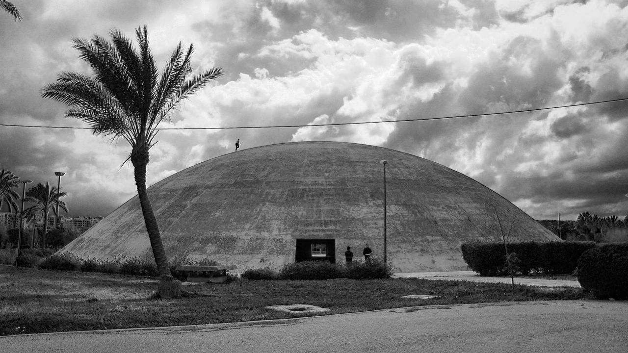 The Experimental Theater is a huge dome with thick concrete walls rising at an extreme angle from the ground. "It's not easy to make such a form without concrete, so in the '50s and '60s it was considered extremely modern," says local guide Mira Minkara.