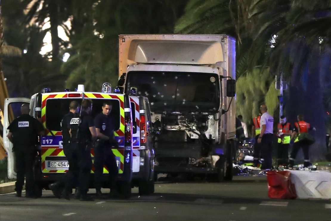 Police are at the scene with the truck used in the Bastille Day attack on Nice's Promenade des Anglais.