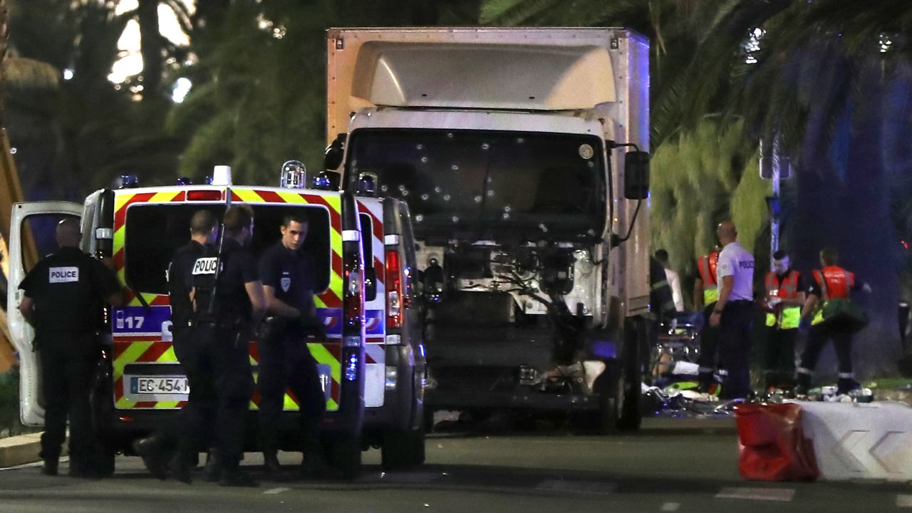 Police are at the scene with the truck used in the Bastille Day attack on Nice's Promenade des Anglais.