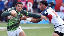 LAS VEGAS, NV - MARCH 06:  Bryan Habana (L) of South Africa carries the ball against Martin Iosefo of the United States during the USA Sevens Rugby tournament at Sam Boyd Stadium on March 6, 2016 in Las Vegas, Nevada. South Africa won 21-10.  (Photo by David Becker/Getty Images)