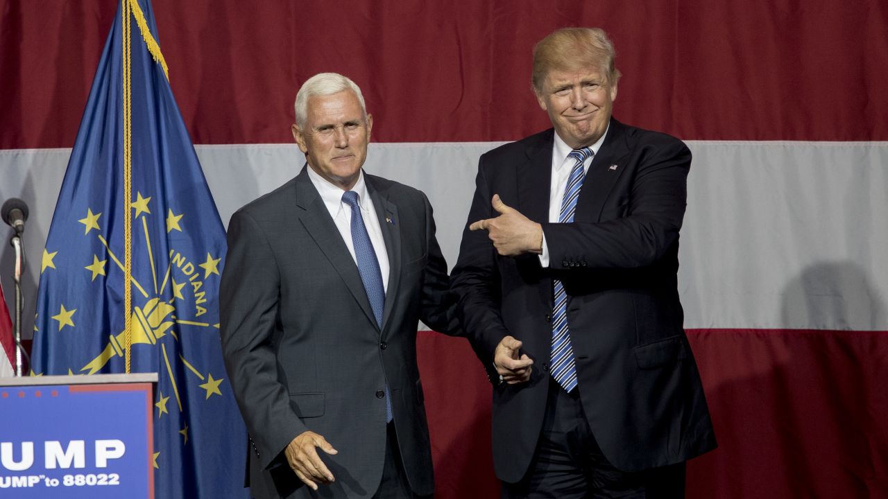 Republican presidential candidate Donald Trump greets Indiana Gov. Mike Pence at the Grand Park Events Center on July 12, 2016 in Westfield, Indiana. Trump is campaigning amid speculation he may select Indiana Gov. Mike Pence as his running mate.