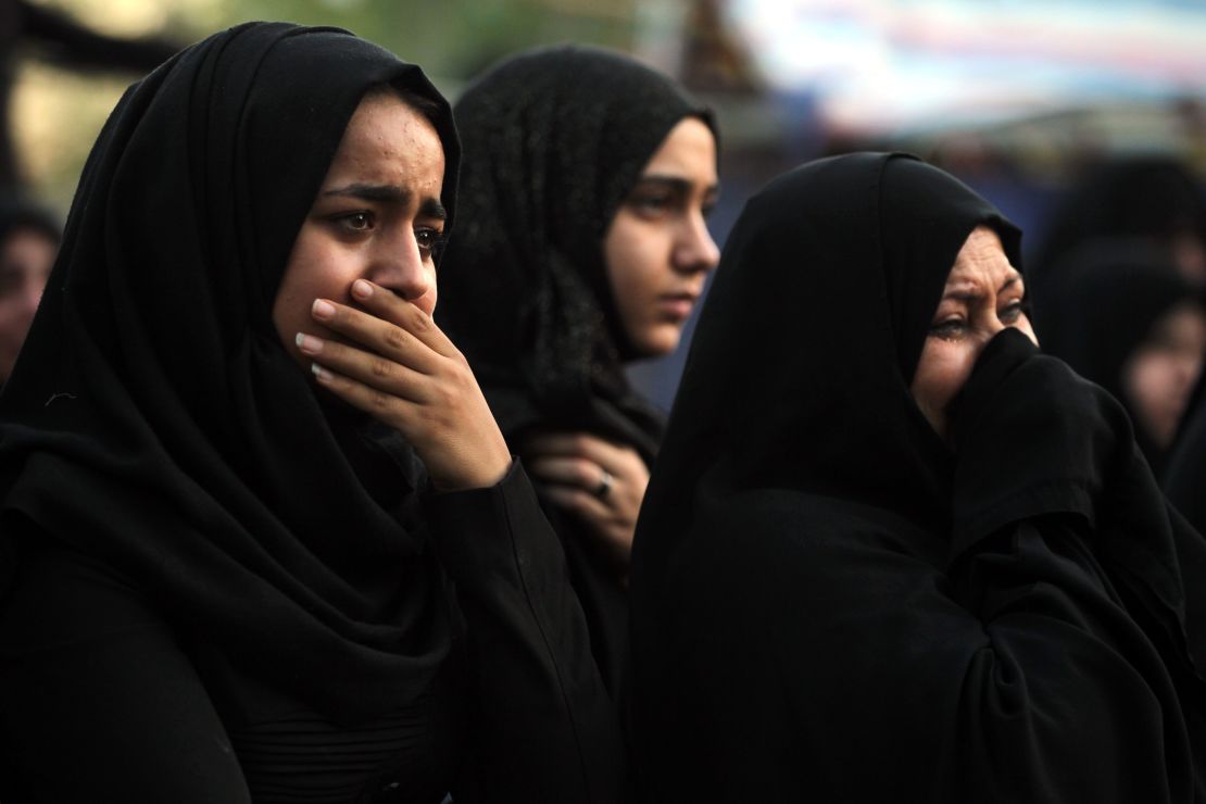 Women mourn at the site of a suicide bombing on July 3 in Baghdad's Karrada neighborhood.