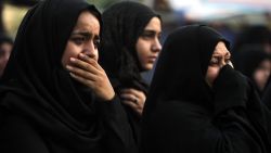Iraqi women react as people gather on July 9, 2016 at the site of a suicide-bombing attack which took place on July 3 in Baghdad's Karrada neighbourhood.

The Baghdad bombing claimed by the Islamic State group killed 292 people, according to a new toll issued on July 7, many of whom were trapped in blazing buildings and burned alive. A suicide bomber detonated an explosives-laden minibus early on July 3, ahead of the Eid al-Fitr holiday marking the end of the holy Muslim fasting month of Ramadan. / AFP / AHMAD AL-RUBAYE        (Photo credit should read AHMAD AL-RUBAYE/AFP/Getty Images)