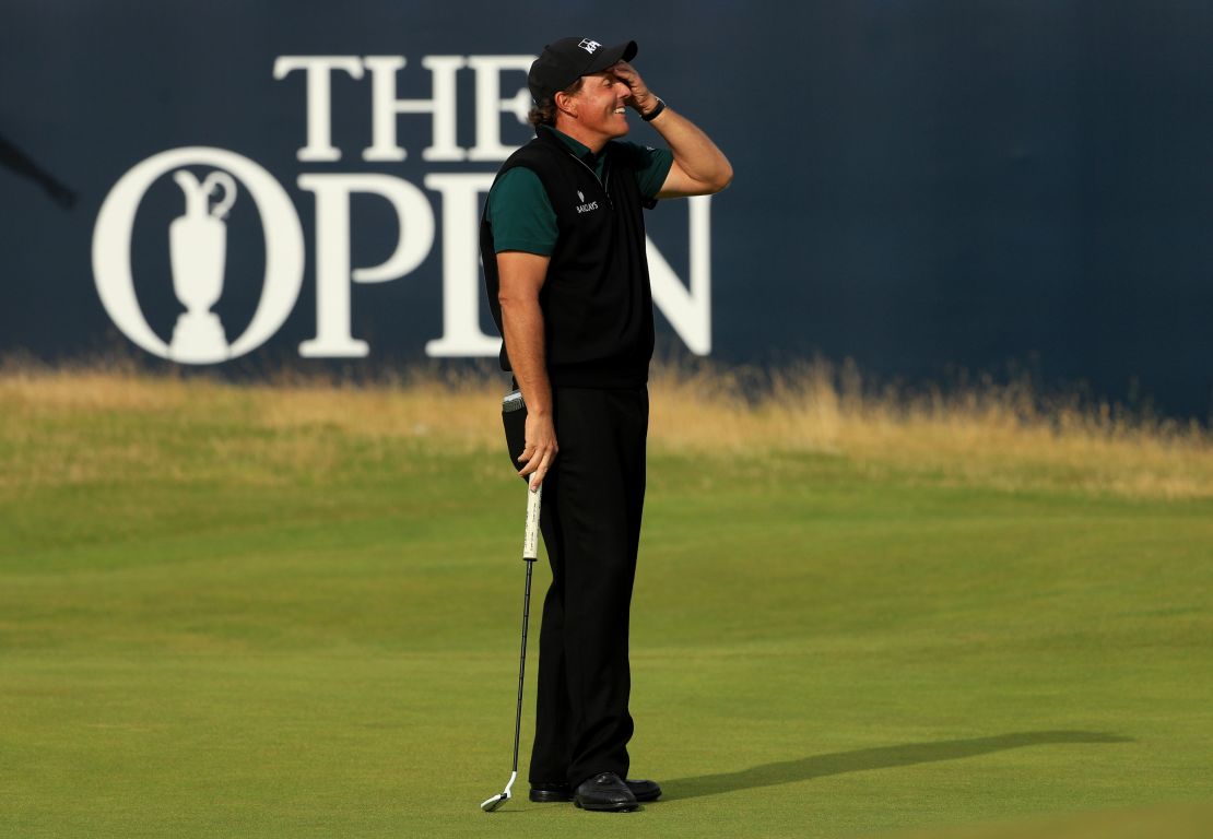 Mickelson was devastated to see his final history-making putt stay out.
