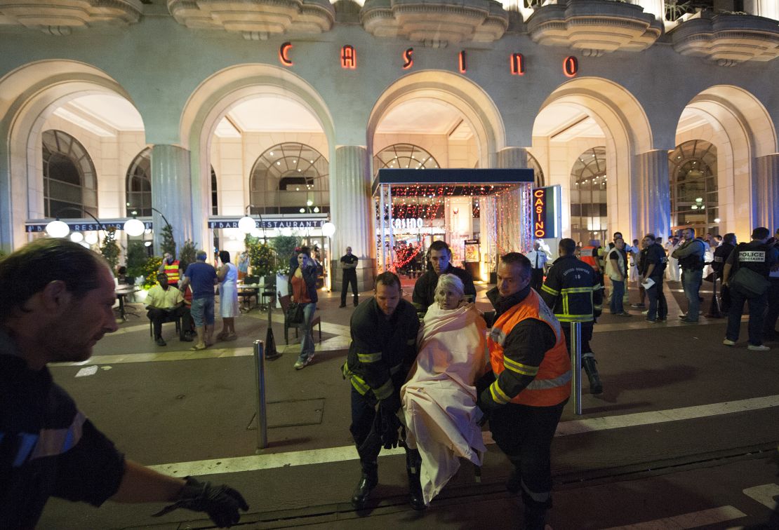 Wounded victims of the attack in Nice, France, are evacuated from the scene.