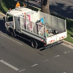 Eyewitness photo provided to CNN shows unattended strollers being removed the from the scene of the Nice terror attack.