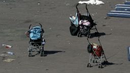 View of some baby carriage next to sheets that have been use to cover the bodies are seen the 'Promenade des Anglais' where the truck crashed into the crowd during the Bastille Day celebrations, in Nice, France, 15 July 2016. According to reports, at least 84 people died and many were wounded after a truck drove into the crowd on the famous Promenade des Anglais during celebrations of Bastille Day in Nice, late 14 July. Anti-terrorism police took over the investigation in the incident, media added. EFE/Alberto Estevez (Newscom TagID: efephotos420061.jpg) [Photo via Newscom]