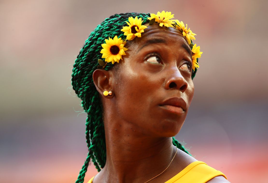 Flower power:  Fraser-Pryce ahead of winning 100m gold at the 2015 world championships.