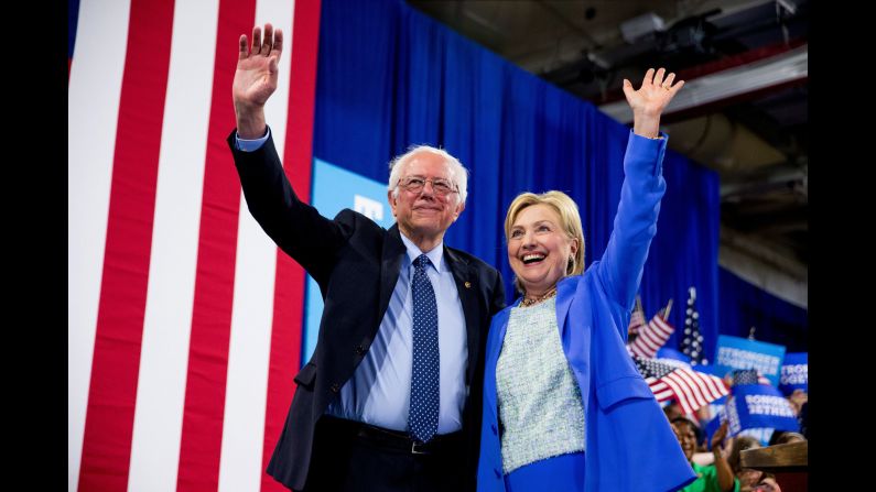 Vermont Sen. Bernie Sanders and Democratic presidential candidate Hillary Clinton wave to supporters during a rally in Portsmouth, New Hampshire, on Tuesday, July 12. <a href="http://www.cnn.com/2016/07/11/politics/hillary-clinton-bernie-sanders/" target="_blank">Sanders officially endorsed Clinton</a>, saying, "I intend to do everything I can to make certain she will be the next president of the United States." 