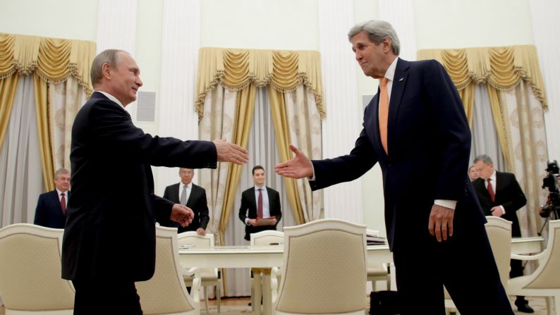 Russian President Vladimir Putin, left, and U.S. Secretary of State John Kerry meet at Moscow's Kremlin on Thursday, July 14.
