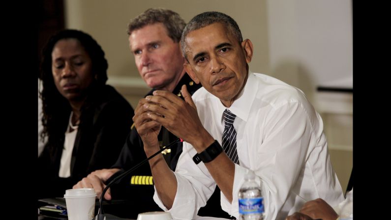 U.S. President Barack Obama hosts a conversation on community policing and criminal justice in the Eisenhower Executive Office Building of the White House on Wednesday, July 13.