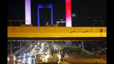 Turkish soldiers block Istanbul's iconic Bosphorus Bridge.<br />