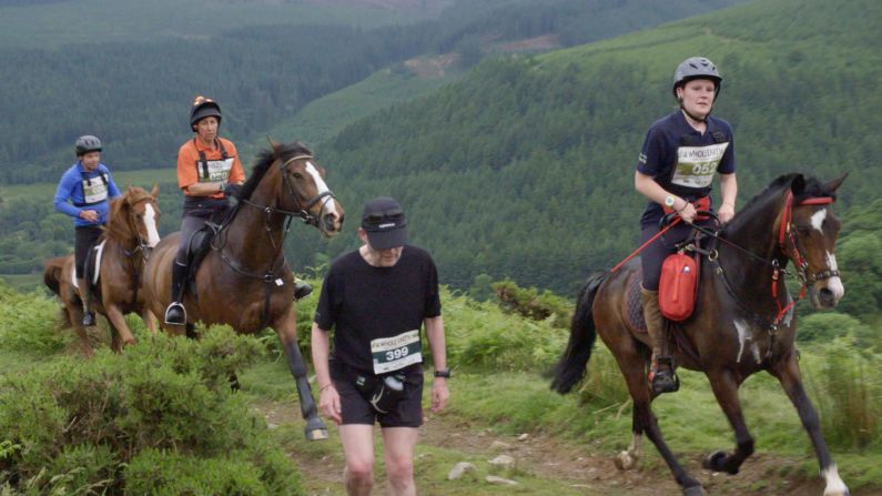 Two miles into the race, the course heads off the paved road and up a trail with a steep incline of roughly 30% grade. This is often where horses pass most of the runners, who tend to walk this section.<br />