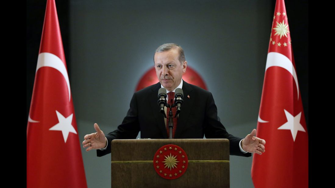 Turkish President Recep Tayyip Erdogan addresses a crowd gathered at his palace for Iftar -- the meal eaten after sunset during the Islamic holy month of Ramadan -- in Ankara, Turkey, on Monday, June 27.