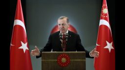 Turkey's President Recep Tayyip Erdogan addresses people gathered for a traditional "Iftar" Muslim feast at his palace in Ankara, Turkey, Monday, June 27, 2016.  Erdogan has apologized to Russia, expressing his "sympathy and deep condolences" to the family of the killed pilot for the downing of a Russian military jet at the Syrian border, Dmitry Peskov spokesman for Russian President Vladimir Putin said on Monday.  (Murat Cetinmuhurdar, Presidential Press Service, Pool via AP)