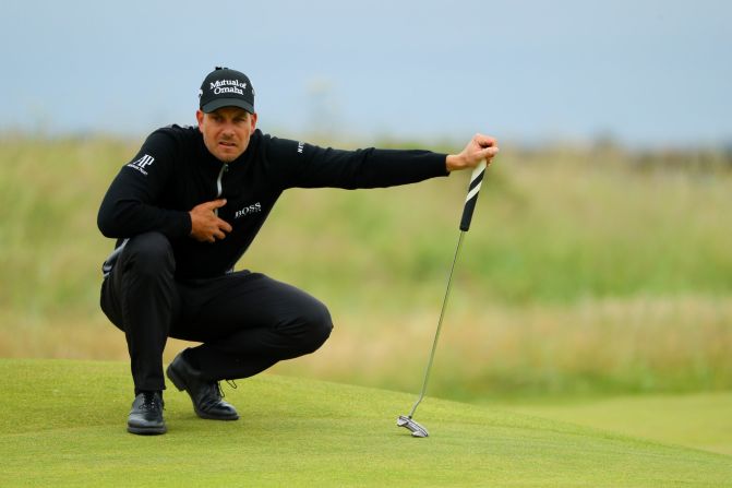 Sweden's Henrik Stenson also copped the rain but shot a remarkable 65 to close Mickelson's lead to one.