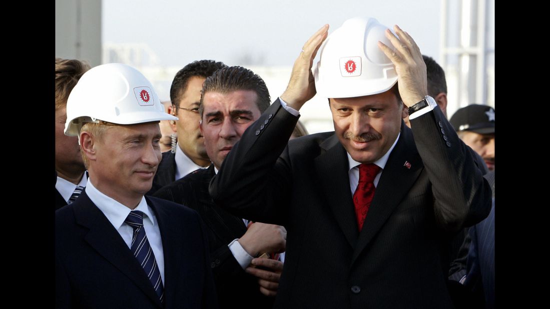 Russian President Vladimir Putin, left, and Erdogan wear helmets in Durusu village near Turkey's northern city of Samsun, on November 17, 2005, during the inauguration ceremony for the major trans-Black Sea gas pipeline Blue Stream. The pipeline runs from Russia to Turkey.