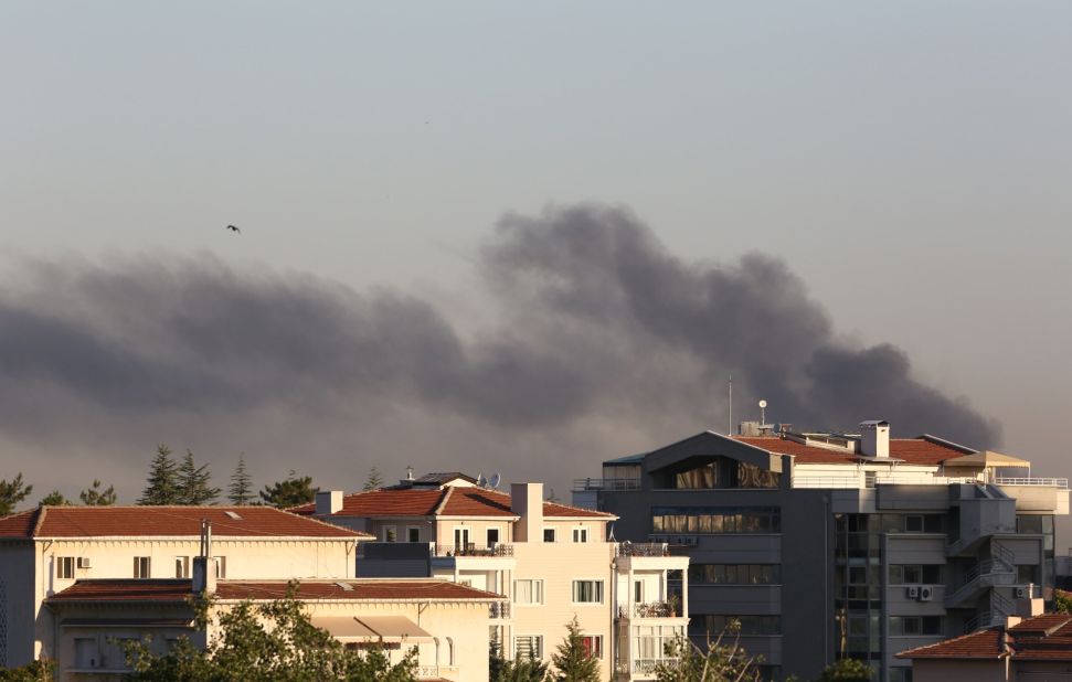 Smoke billows from the direction of the Presidential Palace in Ankara on July 16.