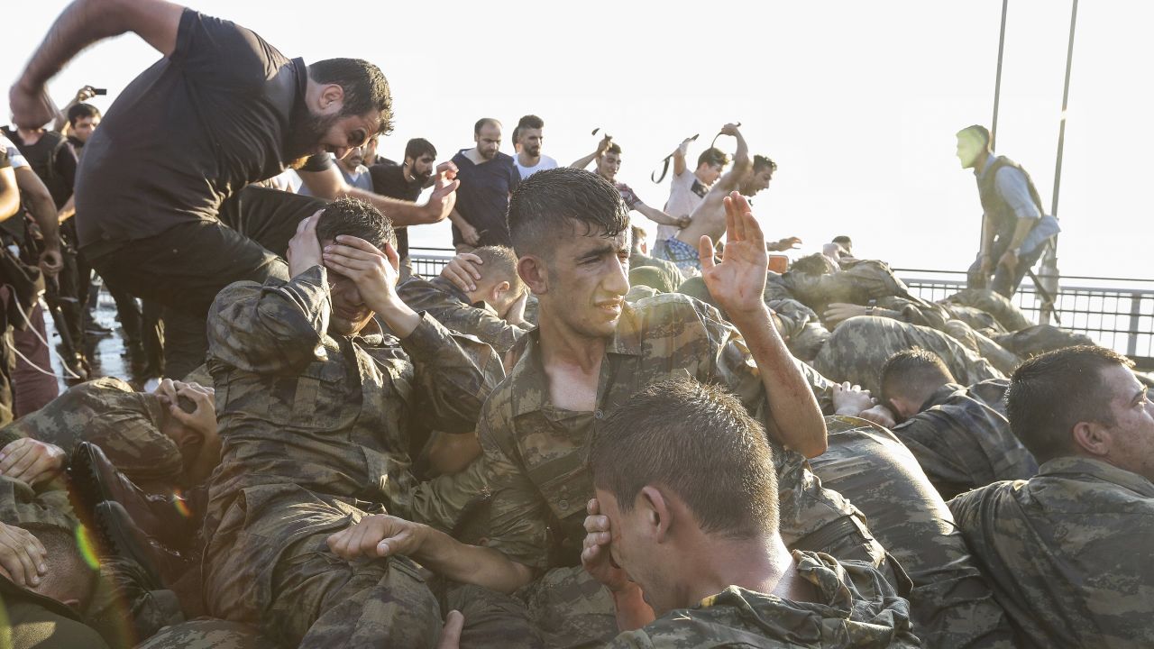 Soliders involved in the coup attempt surrender on  Bosphorus Bridge on July 16 in Istanbul.