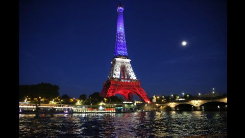 The Effiel Tower is illuminates in the colors of French national flag to pay tribute to the victims of the Nice terrorist attack France on July 15