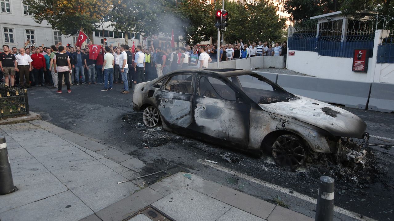 A burned car in Istanbul on Saturday.