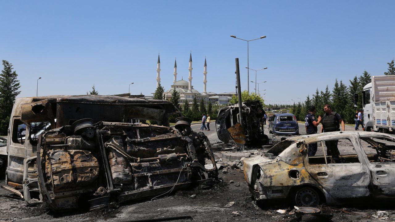 Damaged vehicles are abundant outside the presidential palace in Ankara on July 16.