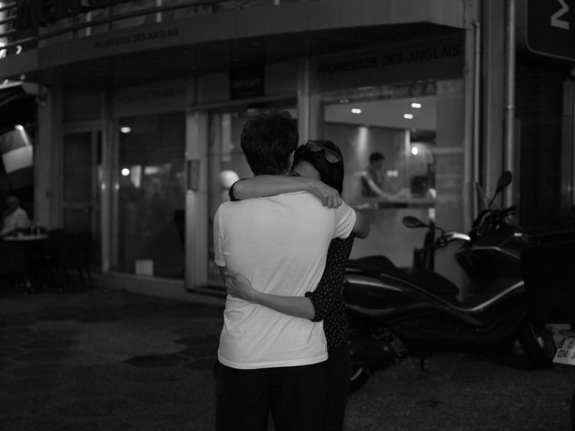 Two people embrace. Near the Promenade des Anglais, Sanguinetti says people were hugging and leaving flowers.