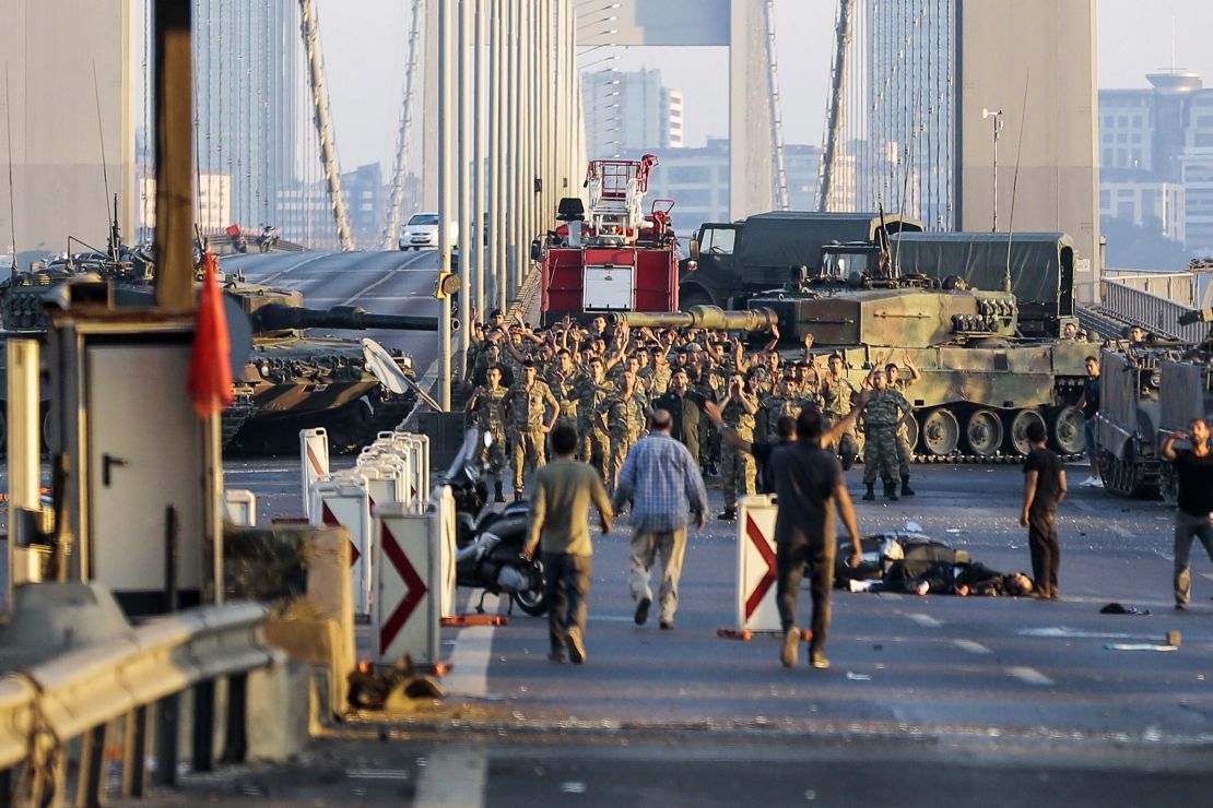 Soldiers in the coup attempt surrender Saturday on Istanbul's Bosphorus Bridge. 