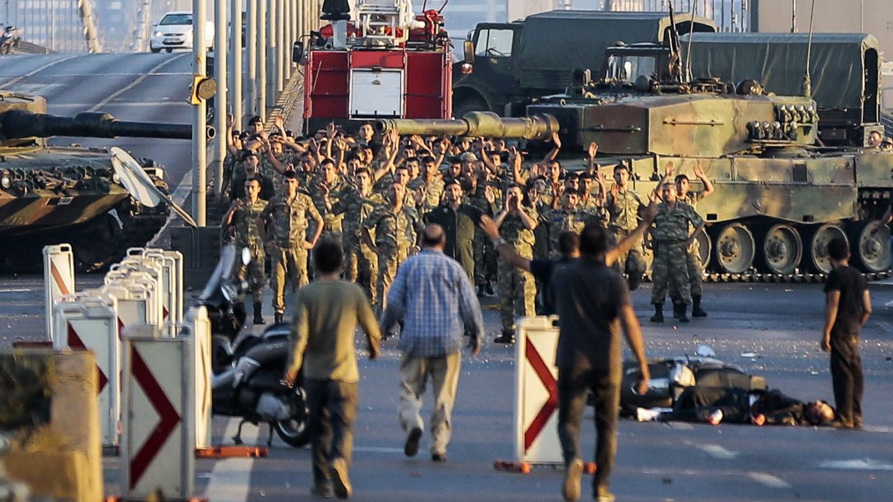 Soldiers in the coup attempt surrender Saturday on Istanbul's Bosphorus Bridge. 