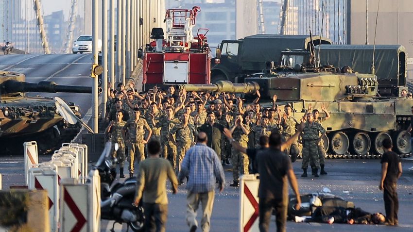 ISTANBUL, TURKEY - JULY 16: Soldiers involved in the coup attempt surrender on Bosphorus bridge with their hands raised on July 16, 2016  in Istanbul, Turkey. Istanbul's bridges across the Bosphorus, the strait separating the European and Asian sides of the city, have been closed to traffic. Turkish President Recep Tayyip Erdogan has denounced an army coup attempt, that has left atleast 90 dead 1154 injured in overnight clashes in Istanbul and Ankara. (Photo by Gokhan Tan/Getty Images)