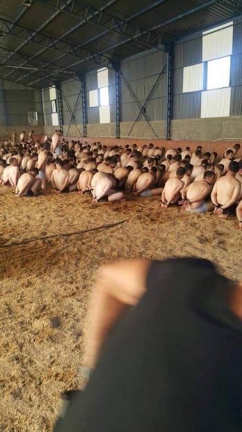 In a mass detention in Ankara, dozens of detainees are forced to kneel, partially stripped.