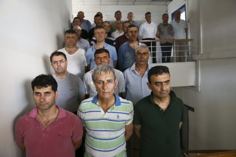 Akin Ozturk, front row, center, a four-star general and former commander of the Turkish air force, is among those in police custody whom President Recep Tayyip Erdogan's government has accused of having led the failed coup attempt.