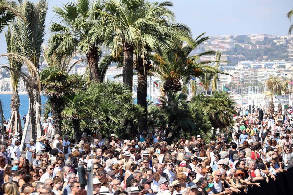 Thousands gather to observe a minute of silence at noon Monday on Nice's Promenade des Anglais. 