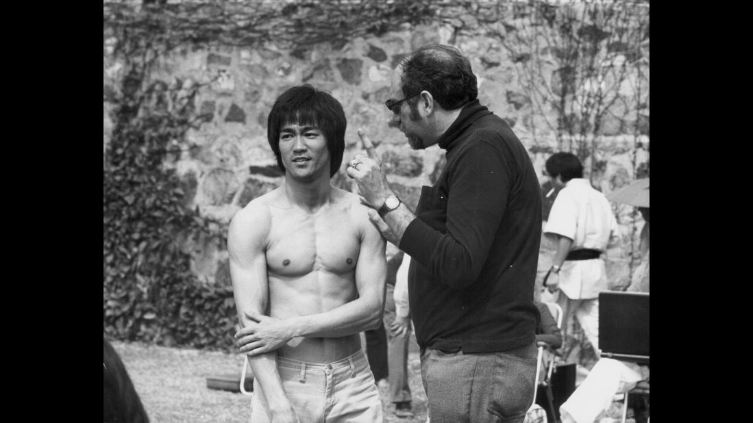 Bruce Lee with producer Fred Weintraub, on the set of the movie "Enter the Dragon," 1973. The movie was his first Hollywood movie and reports said he knew it would be a huge hit even before it came out.