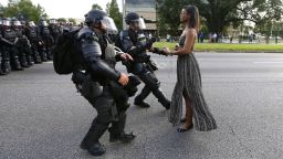 Protestor Ieshia Evans is detained by law enforcement near the headquarters of the Baton Rouge Police Department in Baton Rouge, Louisiana, U.S. July 9, 2016.  REUTERS/Jonathan Bachman     TPX IMAGES OF THE DAY      SEARCH "#BLACK LIVES MATTER" FOR THIS STORY. SEARCH "THE WIDER IMAGE" FOR ALL STORIES. (Newscom TagID: rtrleight015657.jpg) [Photo via Newscom]