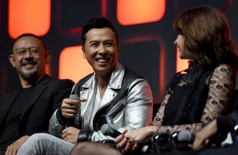 From left, Jiang Wen, Donnie Yen and Felicity Jones during the "Rogue One" panel at the "Star Wars" Celebration. 