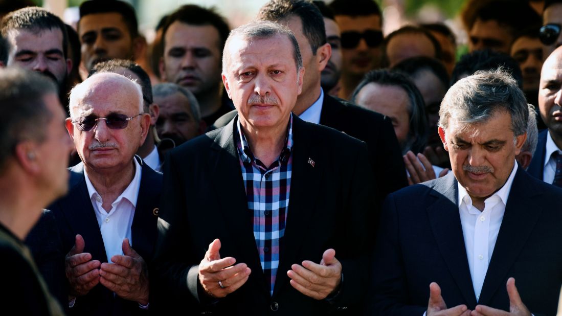 Turkey's President Recep Tayyip Erdogan and former Turkish president Abdullah Gul pray during the funeral of a victim of the coup attempt in Istanbul on July 17. In an interview with CNN's Beckey Anderson Erdogan said, "The people now have the idea, after so many terrorist incidents that these terrorists should be killed, that's where they are, they don't see any other outcome to it. I mean, life sentence, or aggravated life sentence... why should I keep them and feed them in prisons, for years to come, that's what the people say. So, they want a swift end to it, because people lost relatives, lost neighbours, lost children, 8-year-olds, 15-year-olds, 20-year-old young people, unfortunately have all been killed during these incidents. Of course they have parents, mothers and fathers, that are morning, they're suffering so the people are very sensitive and we have to act very sensibly and sensitively."