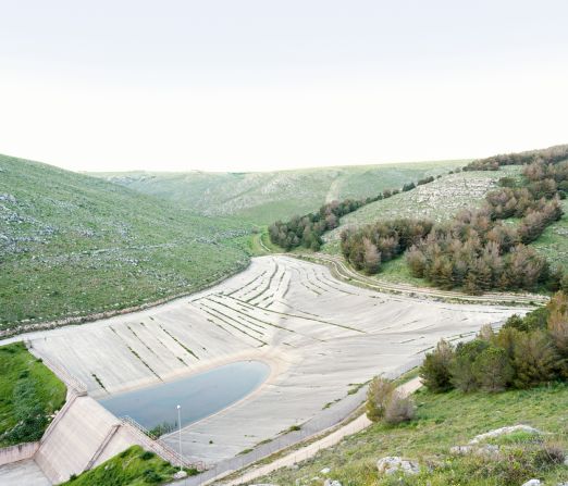 Labourdette shot the photos at dawn or dusk, when "the atmosphere seems to bring out the atemporality of the landscape."