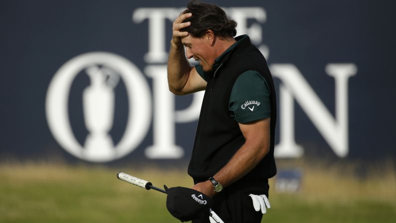 Phil Mickelson reacts Thursday, July 14, after barely missing a putt that would have given him a first-round 62 at the British Open. No one has ever shot 62 in a major tournament. Mickelson <a href="index.php?page=&url=http%3A%2F%2Fedition.cnn.com%2F2016%2F07%2F14%2Fgolf%2Fthe-open-championship-day-one-mickelson-golf%2Findex.html" target="_blank">finished with a 63</a> and went on to finish the tournament in second place behind Henrik Stenson.