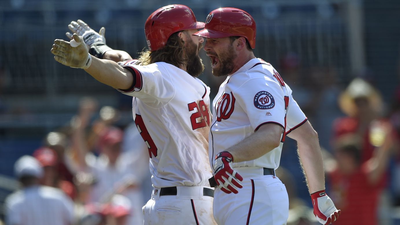 Daniel Murphy, right, celebrates with Washington teammate Jayson Werth after hitting a home run against Pittsburgh on Sunday, July 17. Pittsburgh would go on to win the game in 18 innings.