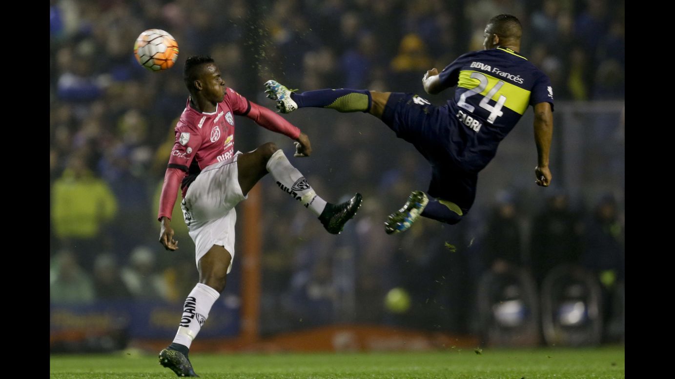 Boca Juniors soccer player Frank Fabra, right, battles for the ball with Jose Angulo of Independiente del Valle on Thursday, July 14. Independiente won the match in Buenos Aires and clinched a spot in the final of Copa Libertadores, the premier club competition in South America. The Ecuadorian club will face Colombian club Atletico Nacional in the finals.