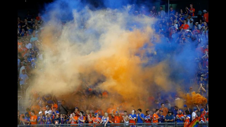 Fans of FC Cincinnati cheer on their soccer team during a home match against England's Crystal Palace on Saturday, July 16.