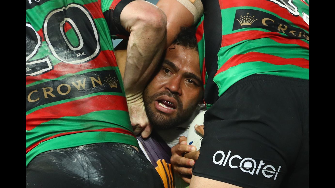 Sam Thaiday of the Brisbane Broncos is tackled by South Sydney Rabbitohs during a National Rugby League match in Sydney on Saturday, July 16.