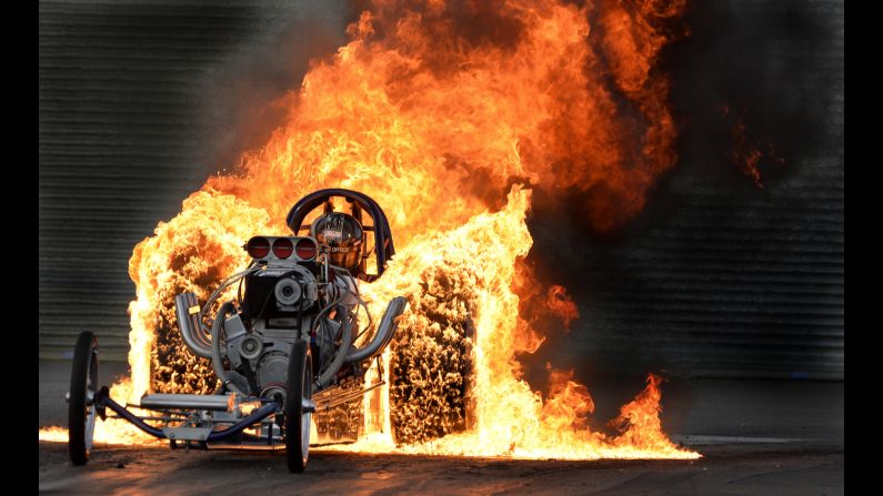 Bob Hawkins performs a flaming burnout during the Dragstalgia event in Wellingborough, England, on Saturday, July 16.