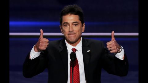 Actor Scott Baio gives two thumbs up during his speech on Monday. "Let's not just make America great again," he said, referring to Trump's  campaign slogan. "Let's make America America again!"