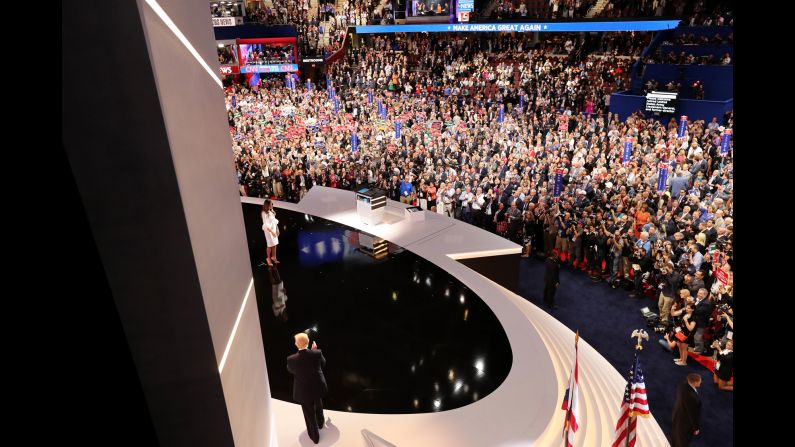 Donald Trump walks to his wife after she delivered her speech.