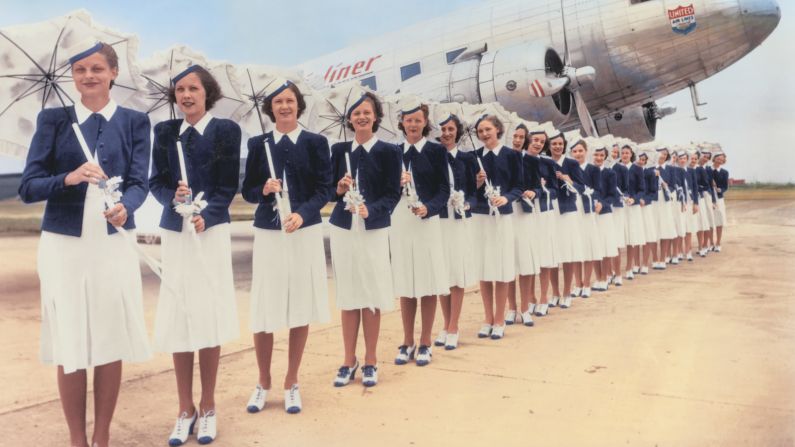 United started coordinating their flight attendant uniforms with the company's colors in this 1939 look by in-house designer Zay Smith. These outfits were used for the airline's Douglas DC-3 service. 