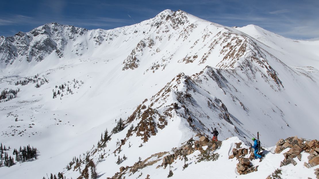Climbing up peaks is part of the challenge of skiing the park's highest mountains.