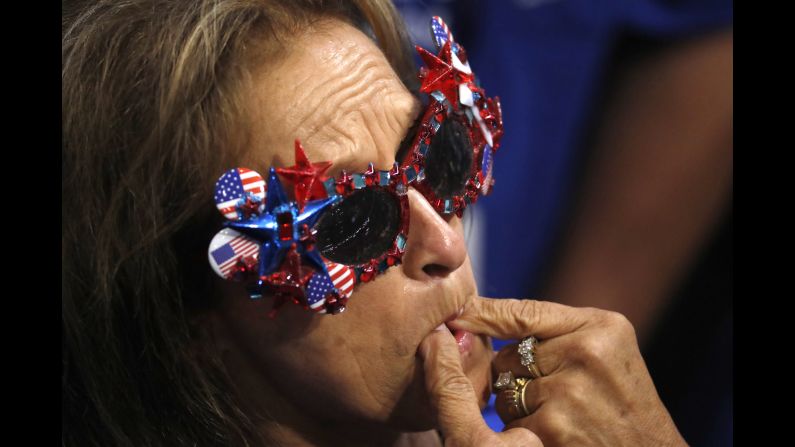 A delegate whistles as roll call votes are cast on Tuesday.